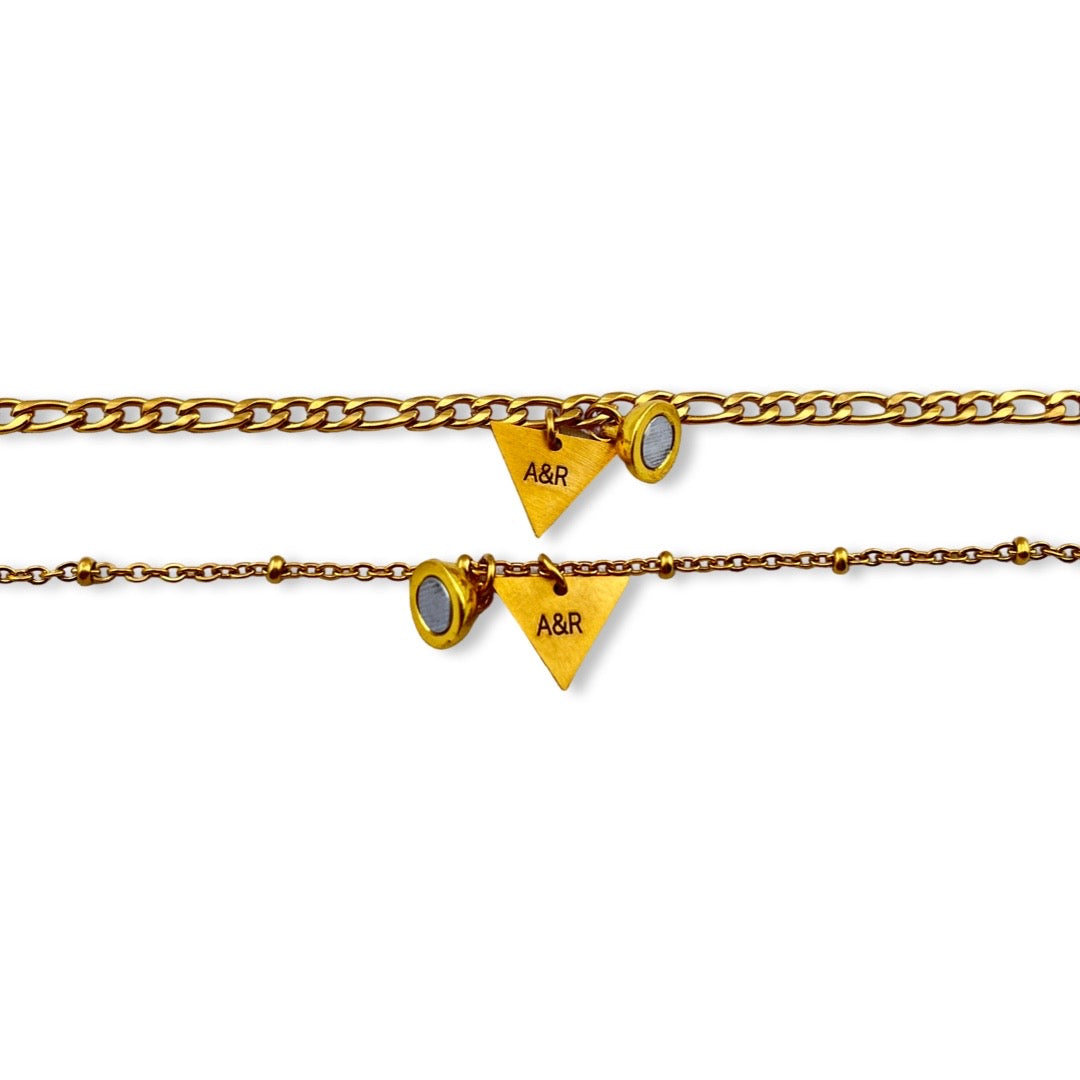 Pulseras de parejas de imán con dije de triangulo