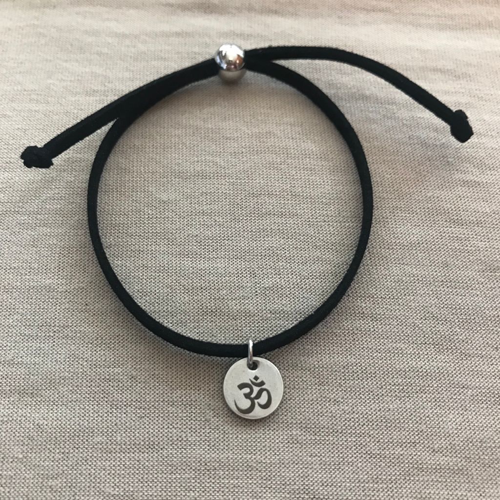 Pulsera unisex con dije de Om