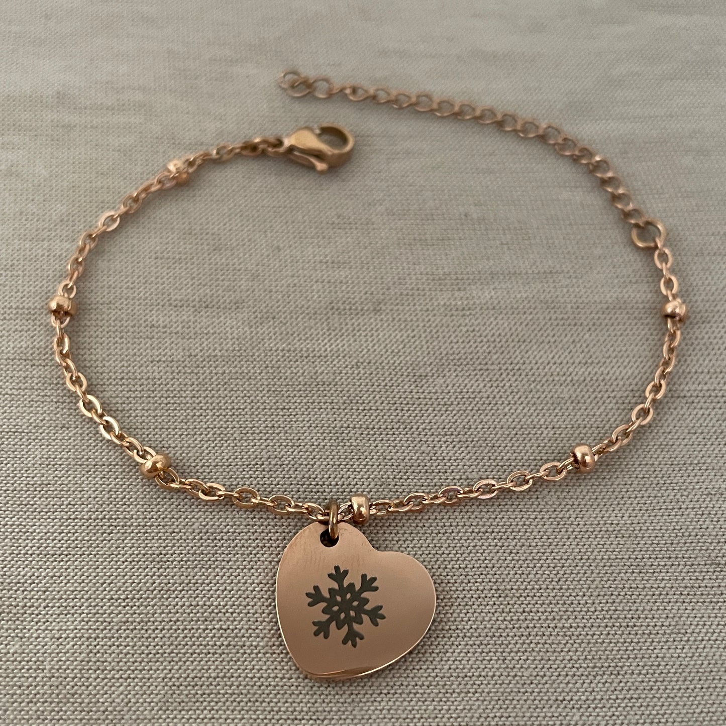 Pulsera de corazón copito de nieve