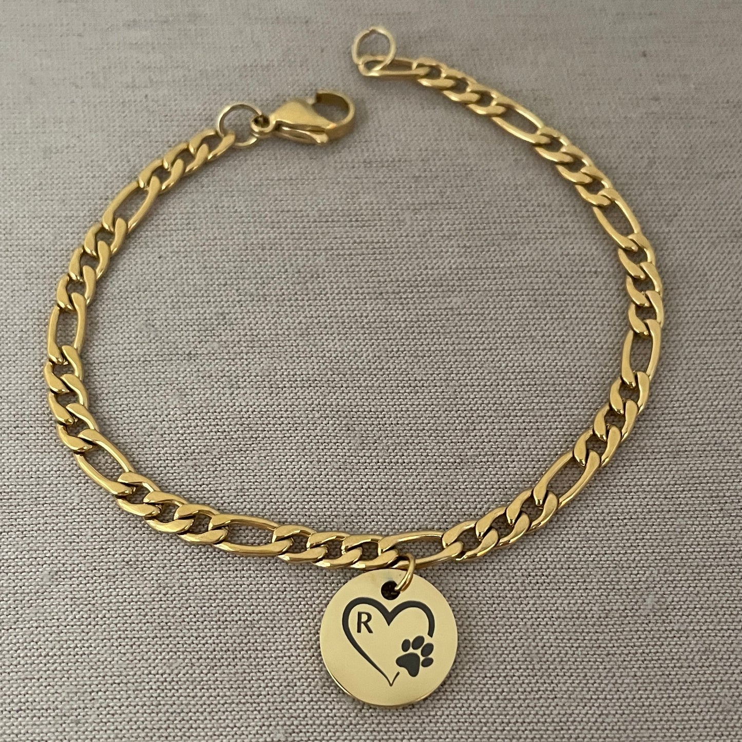 Pulsera unisex con dije de huella con corazón