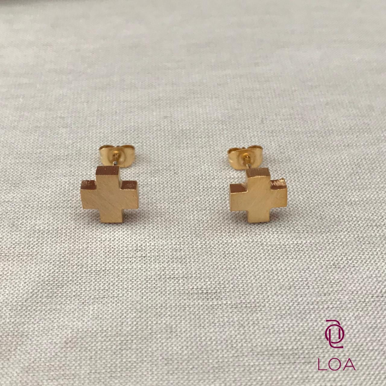 Aretes de acero inoxidable de cruz