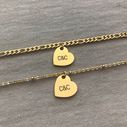 Pulseras de parejas de acero inoxidable personalizadas con dije de corazón