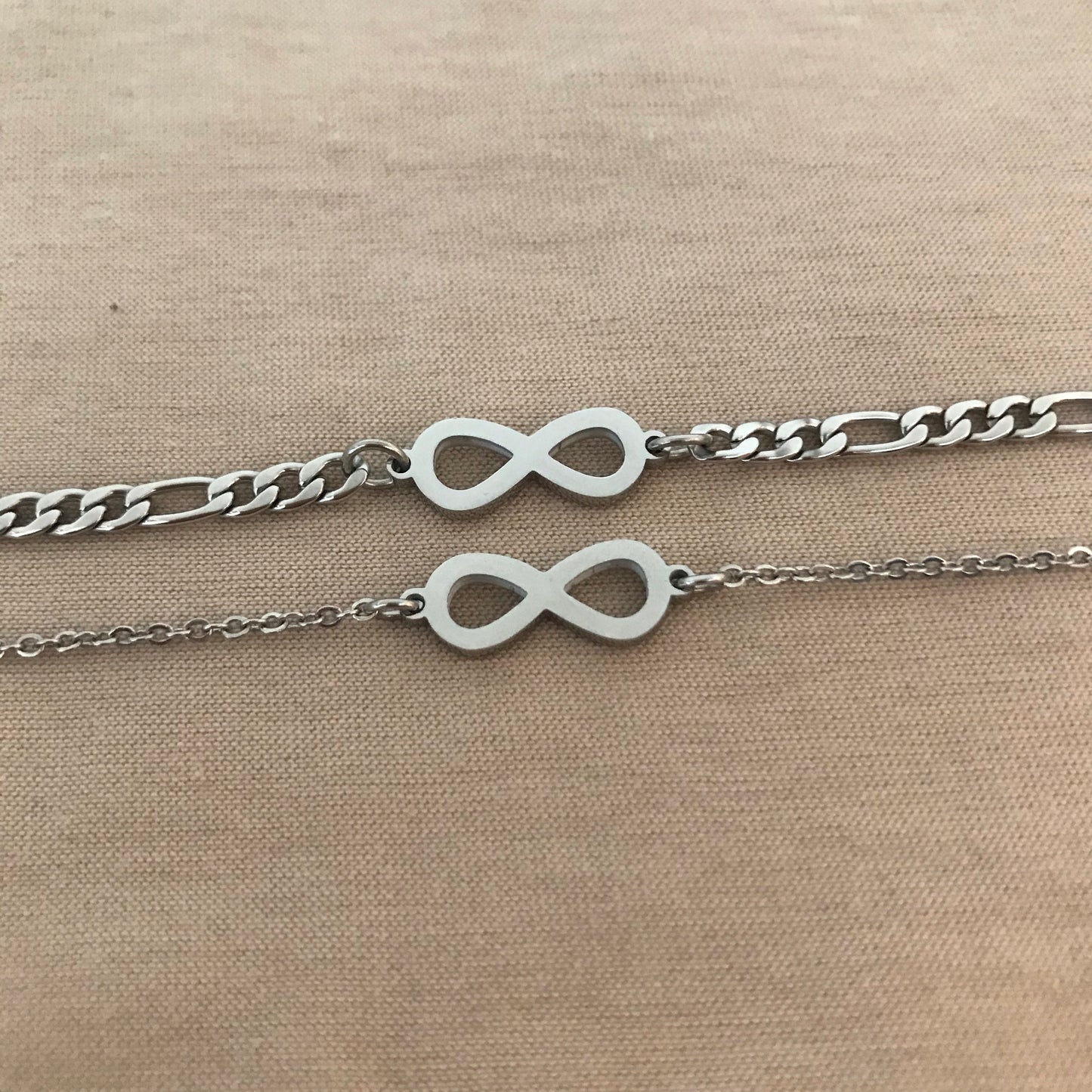 Pulseras de parejas de acero inoxidable con dije infinito